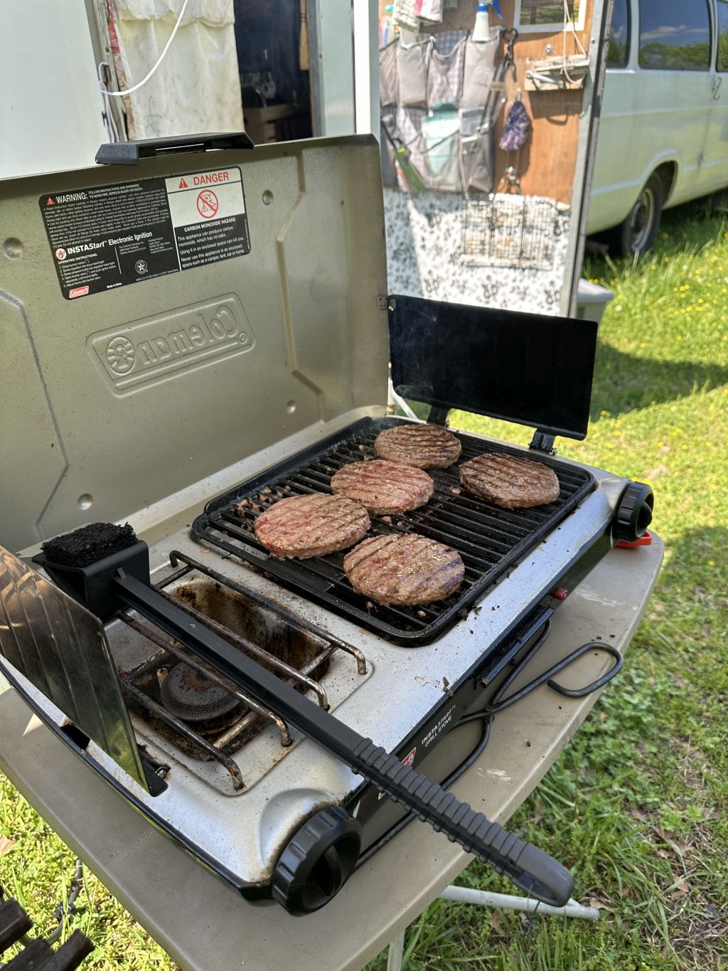 ALStevenson,_cooking-Hamburger-Patties-on-grill